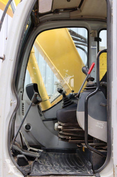 Багер New Holland Kobelco 2