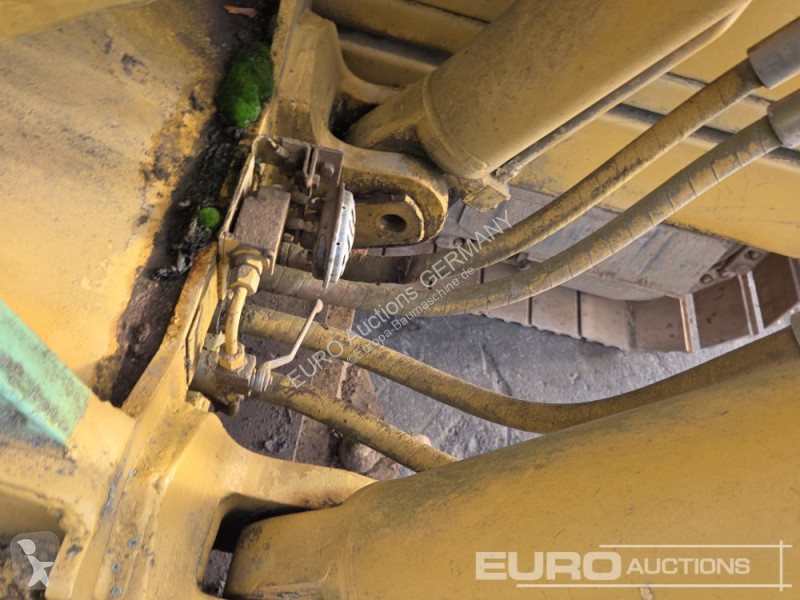 Багер Caterpillar 215C