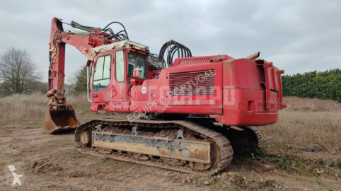 Liebherr R944C V Litronic with quickcoupler, variable-angle boom and 2 buckets