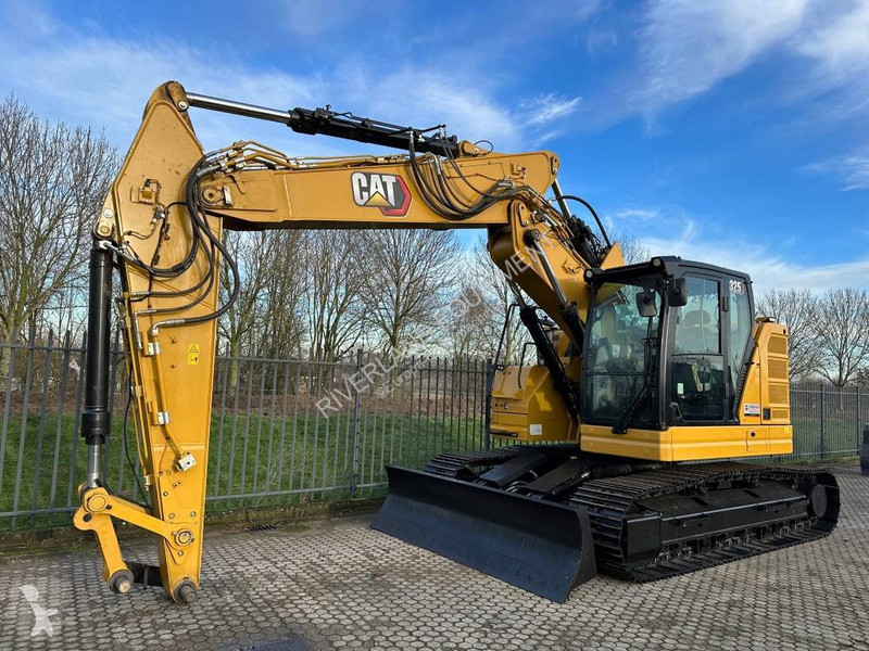 Graafmachine Caterpillar 325 with dozerblade...