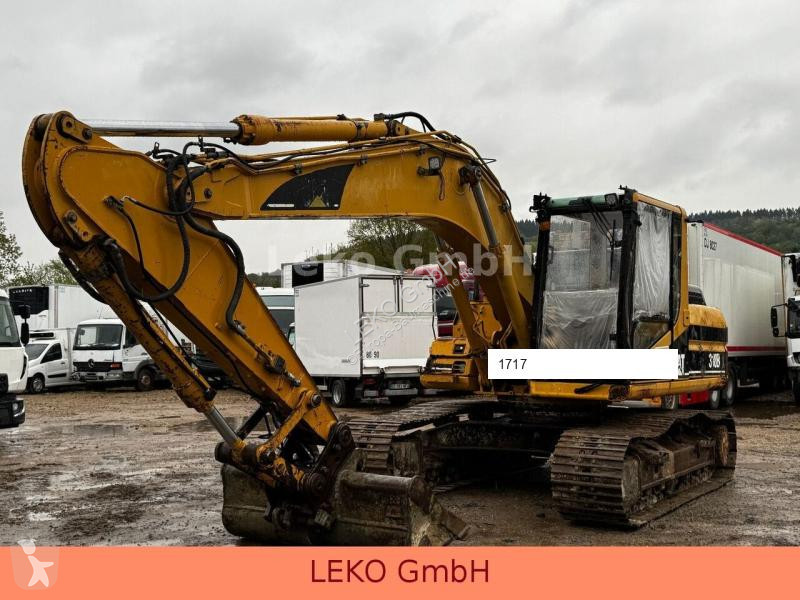 Escavatore Caterpillar 318B Mit Zwei Löffeln