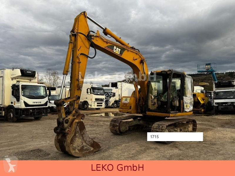 Lopatový nakládač Caterpillar 311C Mit Zwei...