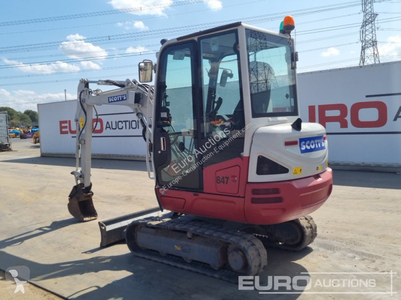 Escavadora Takeuchi 0