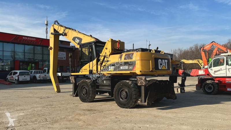 Rýpadlo Caterpillar M 4X4