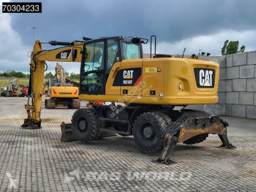 Caterpillar M316 F F Outrigger + Blade