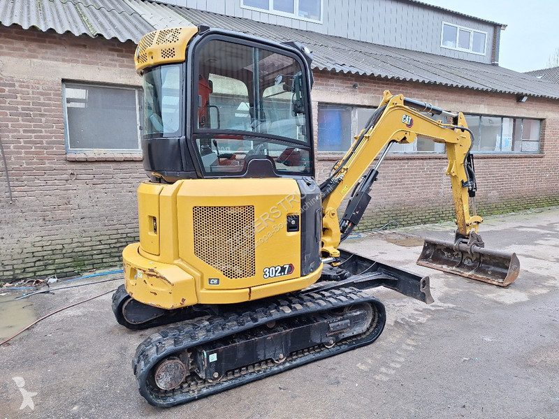 Экскаватор Caterpillar .7