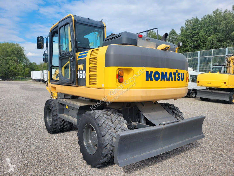Lopatový nakládač Komatsu - 8 A/C 3 ARMS