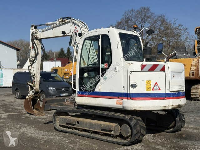 جرافة New Holland E80 BMSR-2 Kettenbagger 8,6...