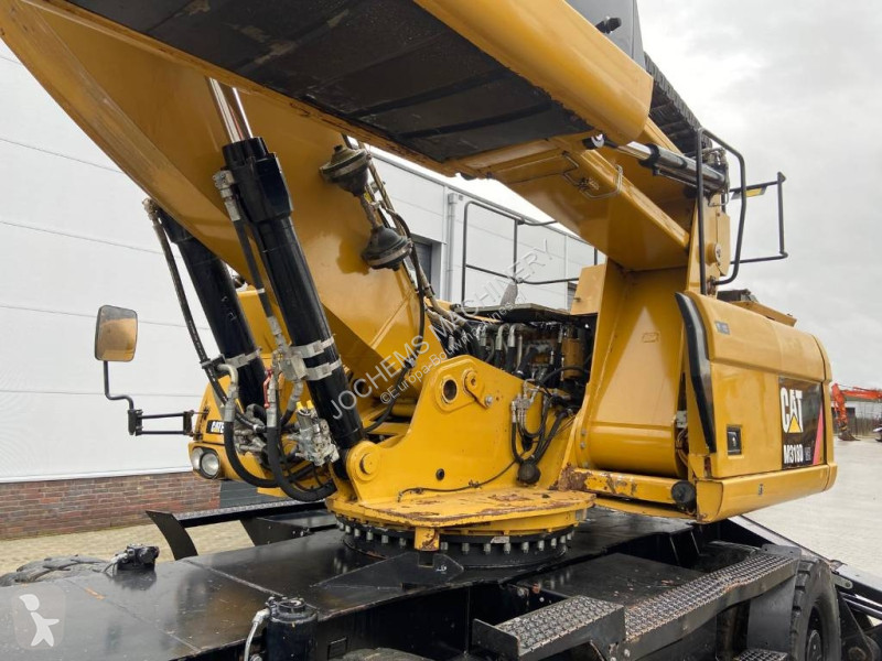 Escavatore Caterpillar M 318 D MH + GRAB