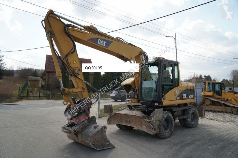 جرافة Caterpillar C / KOPARKA KOŁOWA / TILT...
