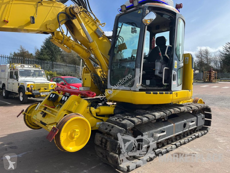 Екскаватор Komatsu 138US2