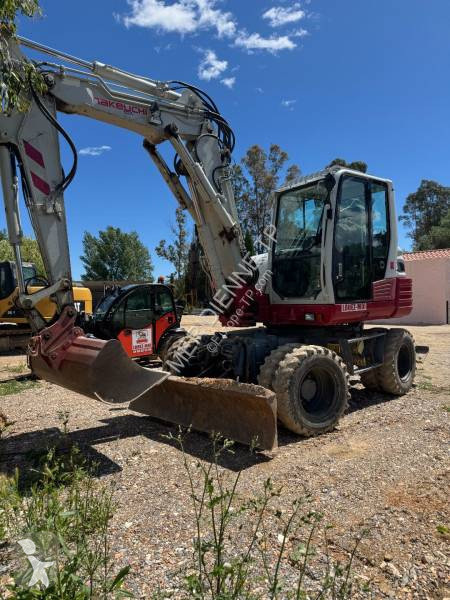 Екскаватор Takeuchi TB295W