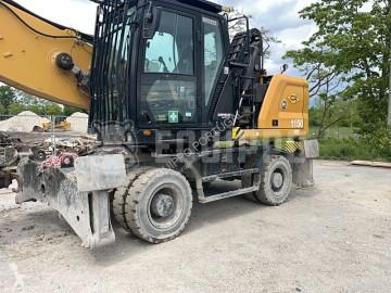 Escavadora de grifa manutenção Caterpillar