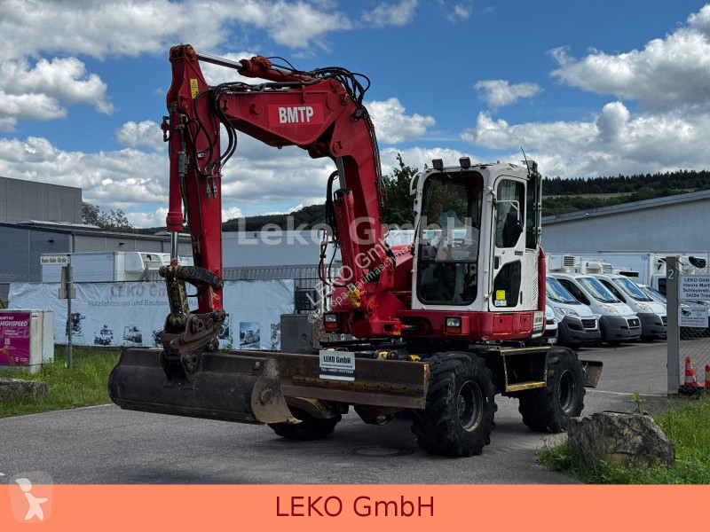 Rýpadlo Komatsu PW118MR-8 Mit Drei Löffeln