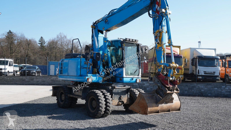 جرافة Komatsu Mobilbagger Verstellausleger HS21