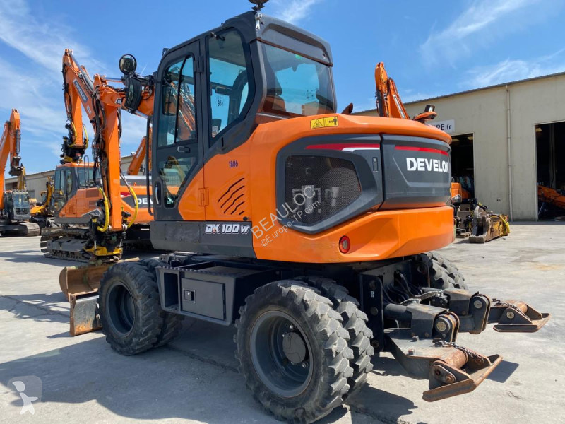 Экскаватор Develon  dx100w