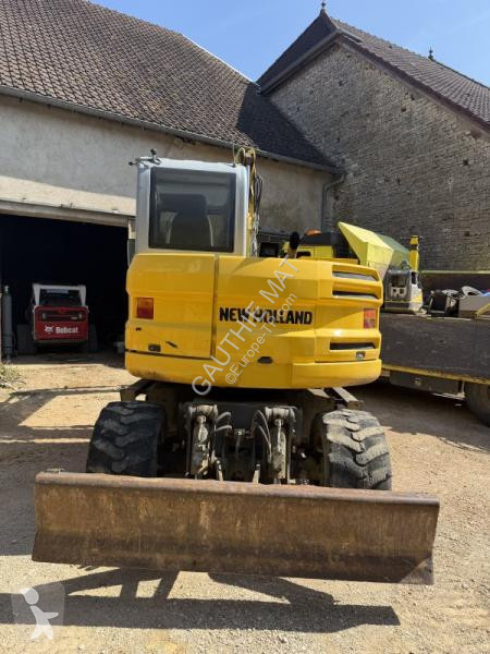 Lopatový nakládač New Holland 26