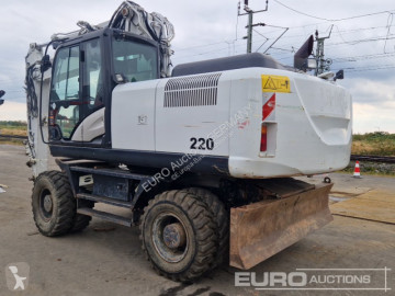 Pelle sur pneus Hitachi
