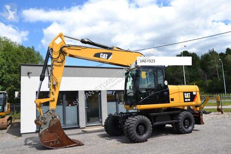 Lopatový nakládač Caterpillar 318 D