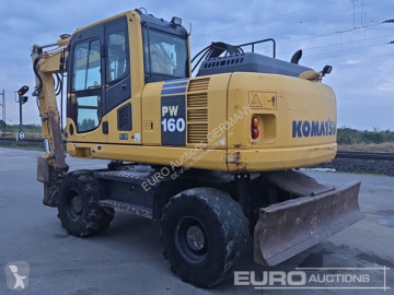 Колісний екскаватор Komatsu