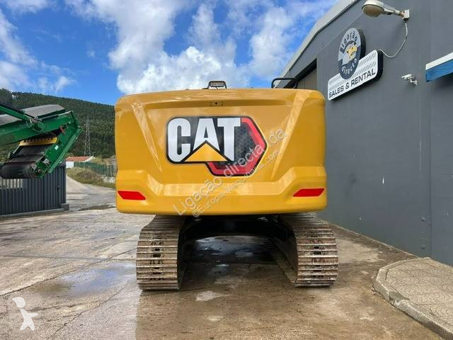 Багер Caterpillar 323