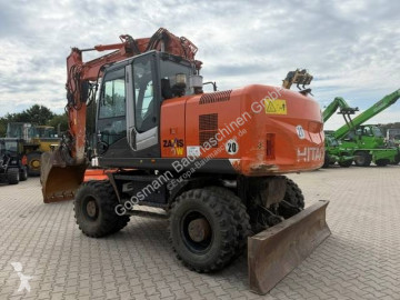 Graafmachine op banden Hitachi
