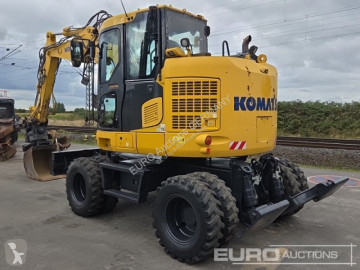 Graafmachine op banden Komatsu