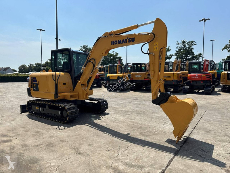Екскаватор Komatsu 7