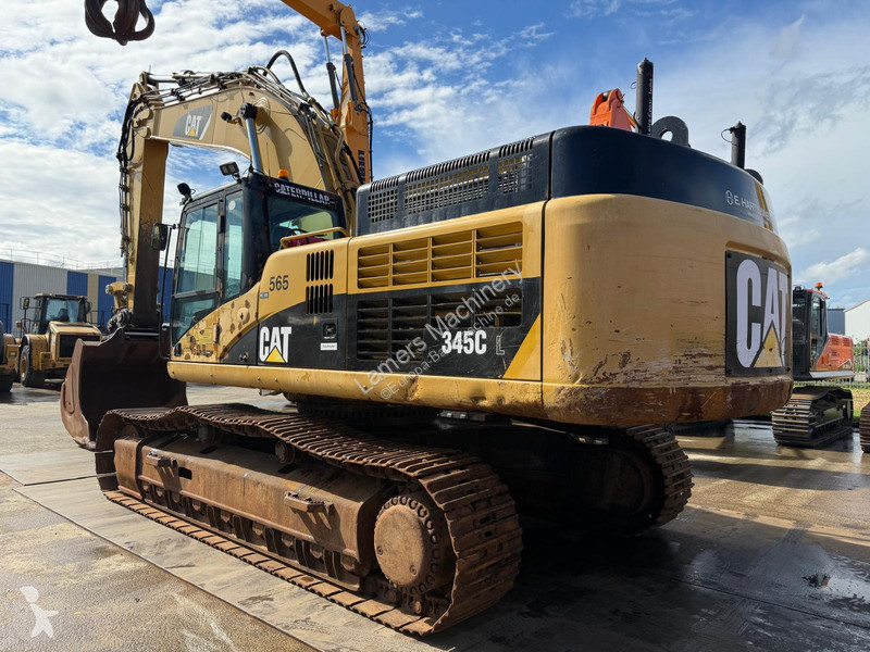 Екскаватор Caterpillar