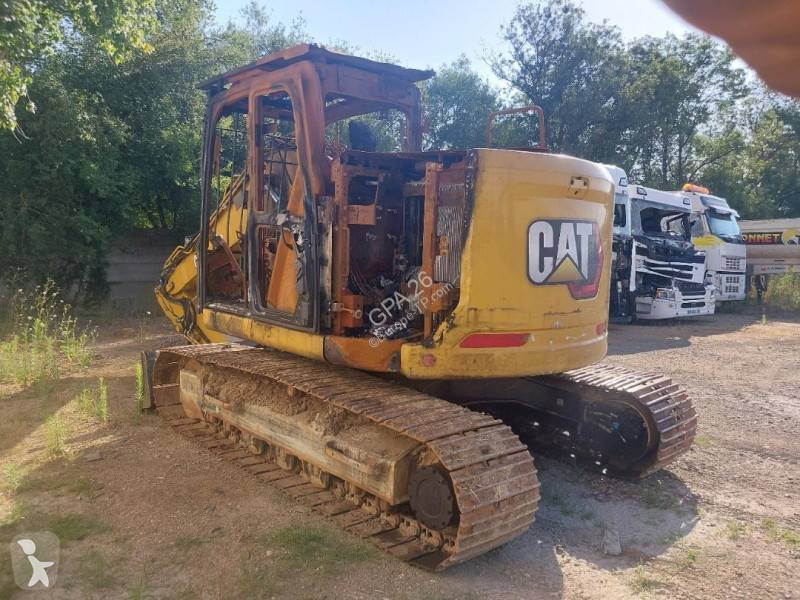 Екскаватор Caterpillar