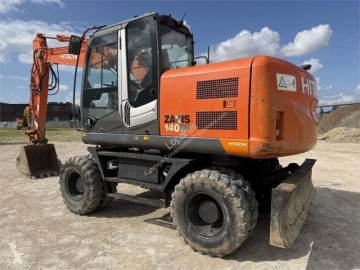 Hitachi gumiabroncsos kotrógép