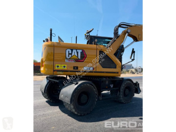 Escavatore gommato Caterpillar