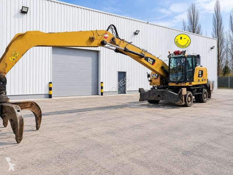 Skovel Caterpillar MH4 + grappin + GRAPPIN
