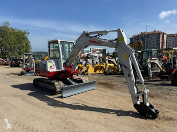 Mini-escavadora Takeuchi