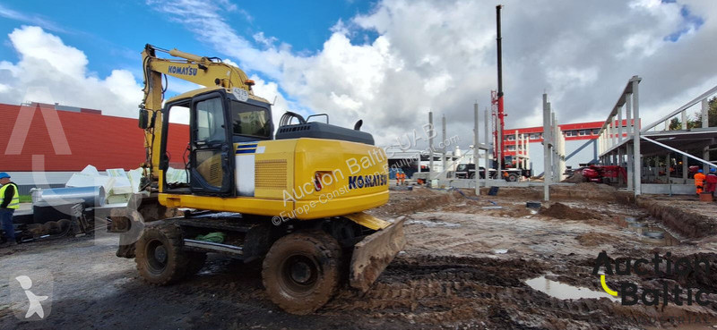 Экскаватор Komatsu E0