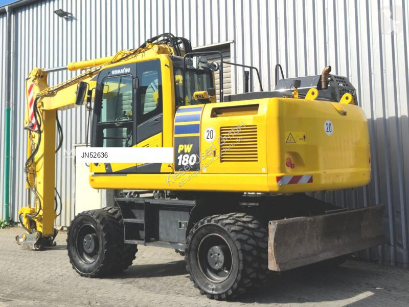 Rýpadlo Komatsu 11