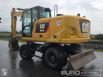 Pelle sur pneus Caterpillar