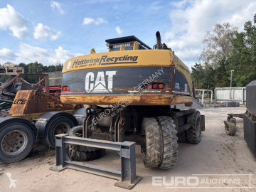 Pelle sur pneus Caterpillar