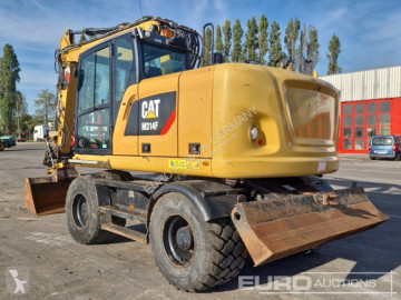 Pelle sur pneus Caterpillar