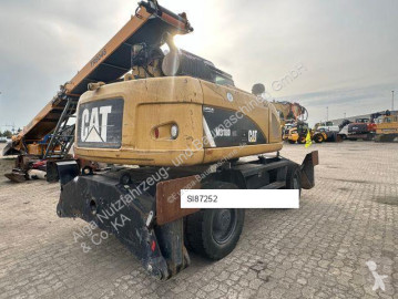 Pelle sur pneus Caterpillar