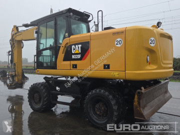 Pelle sur pneus Caterpillar