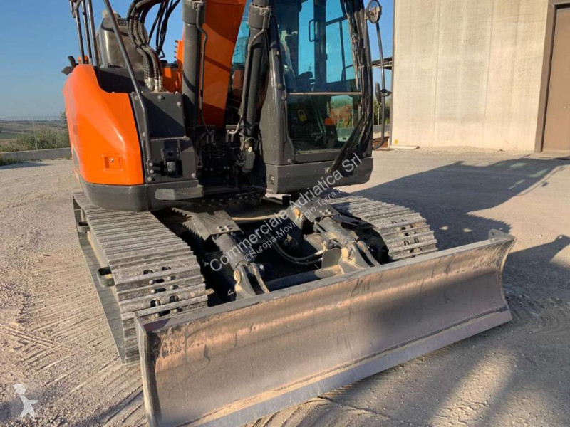 Pelle Develon DX245 NHD
