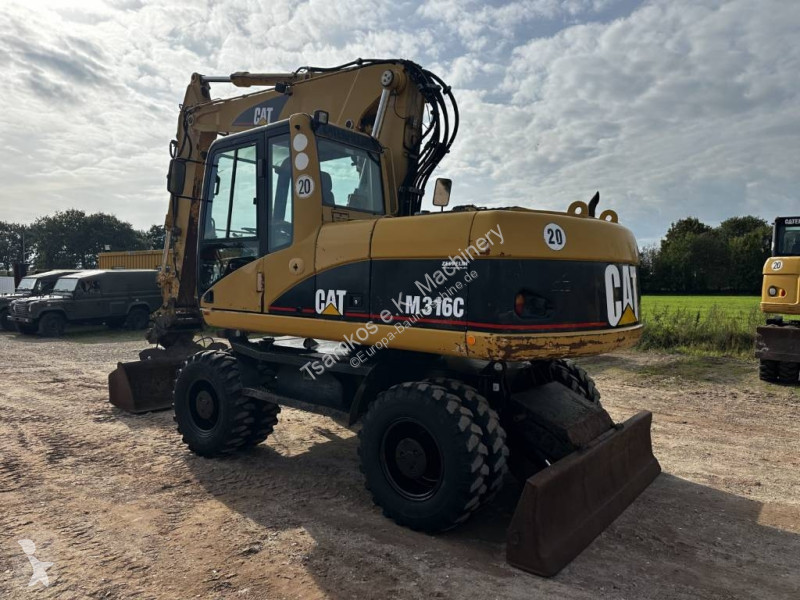 Pelle Caterpillar C full Hydr. Klima German...
