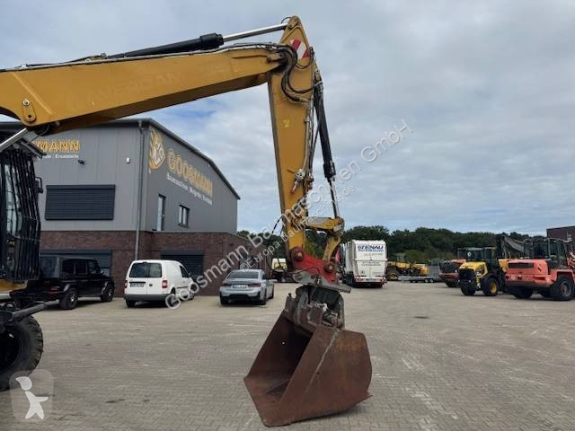 Багер Caterpillar F