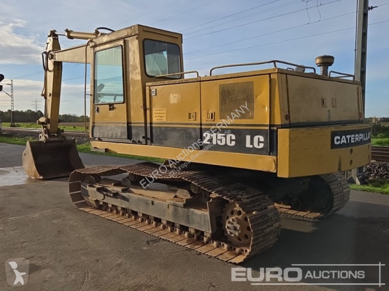 Багер Caterpillar 215C