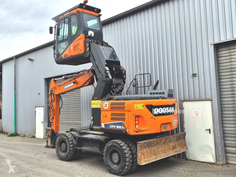 Багер Doosan 5