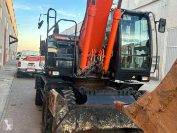 Graafmachine op banden Hitachi