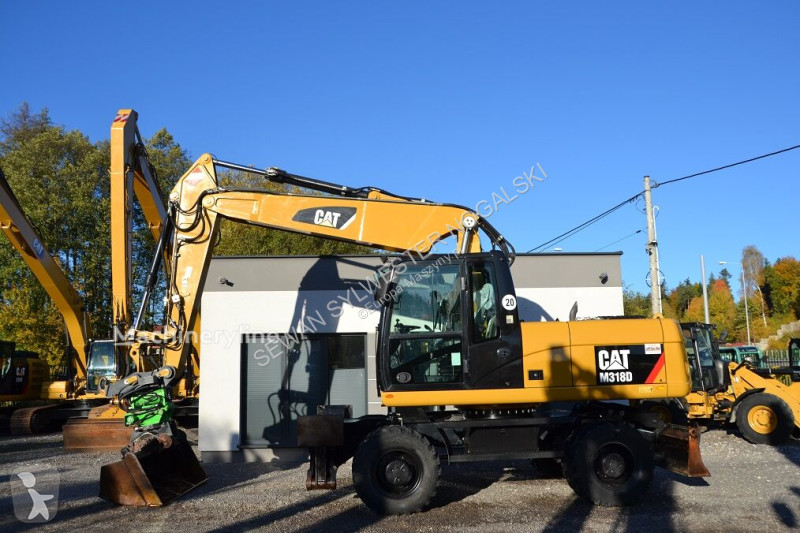 Graafmachine Caterpillar ROTOTILT