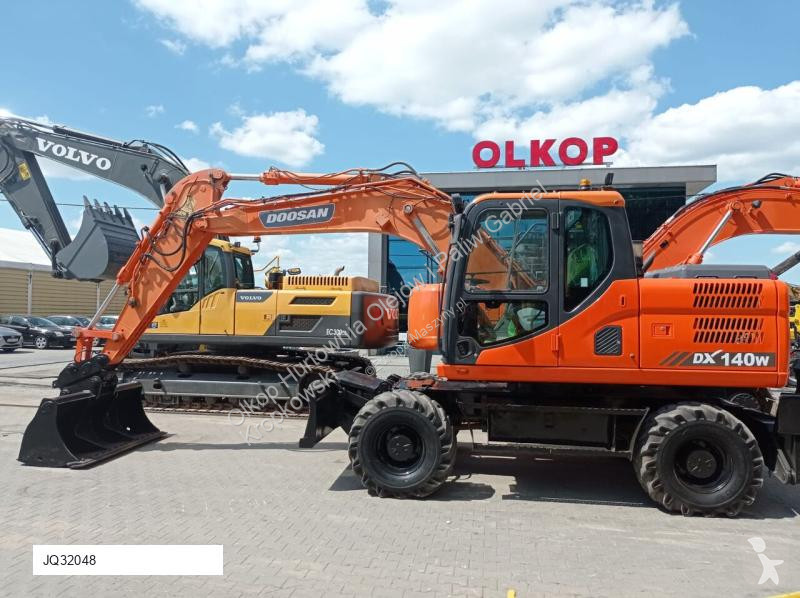 Lopatový nakládač Doosan DX140 W-3 Z SYSTEMEM...