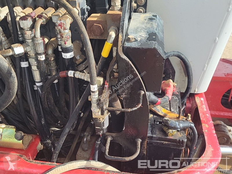 Escavadora Takeuchi 0